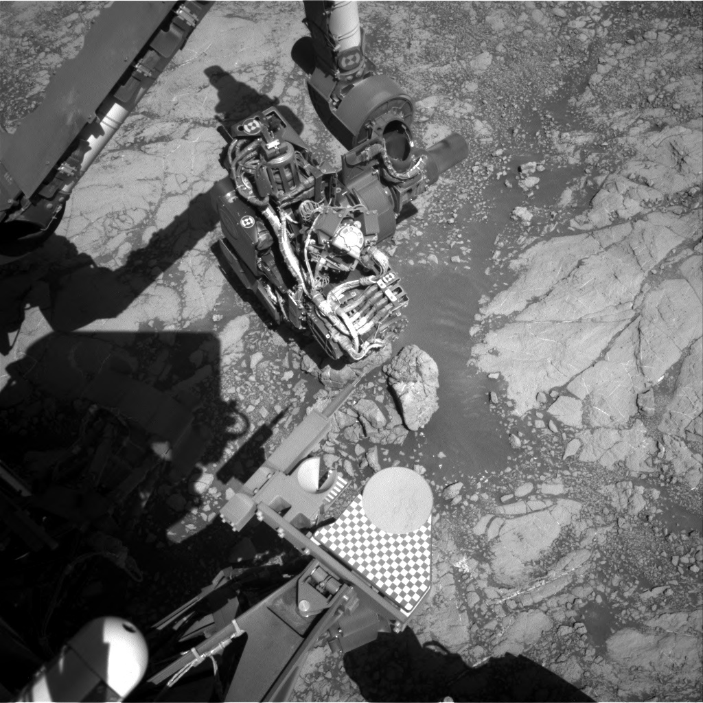 Curiosity's arm and Mars surface