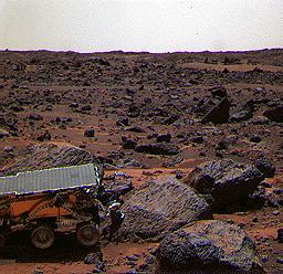 This color image shows NASA's Mars Pathfinder (MPF) Sojourner rover's Alpha Proton X-ray Spectrometer (APXS) deployed against the rock 'Moe' on the morning of Sol 65. This image was taken by by NASA's Mars Pathfinder (MPF).