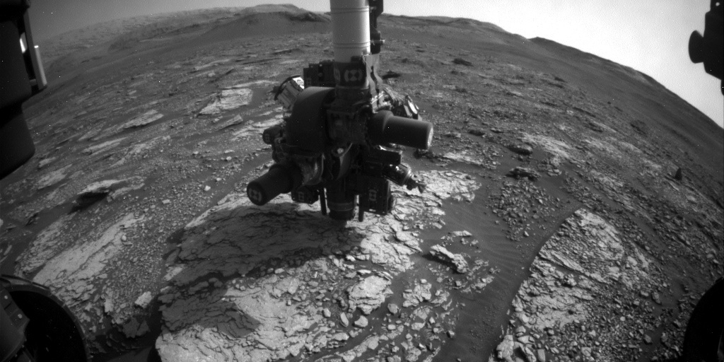 Curiosity's arm on the Mars ground