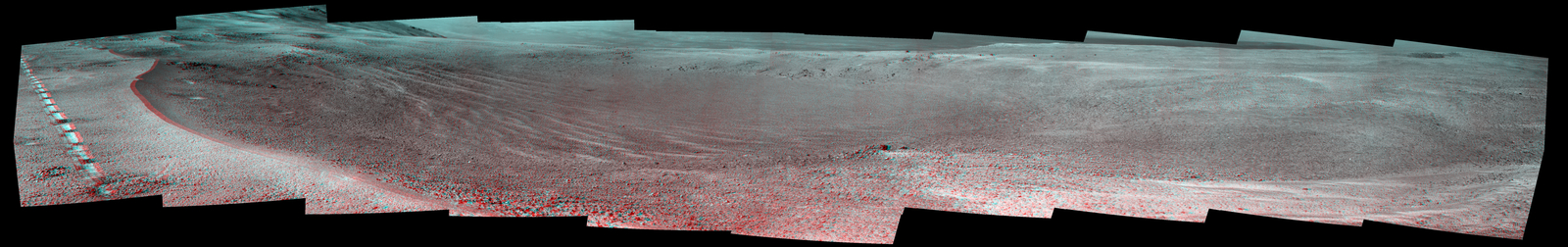 This view of a 90-foot-wide, relatively fresh crater on Mars, "Orion Crater," combines images from the left eye and right eye of the Panoramic Camera (Pancam) on NASA's Mars Exploration Rover Opportunity. It appears three-dimensional when seen through blue-red glasses with the red lens on the left.