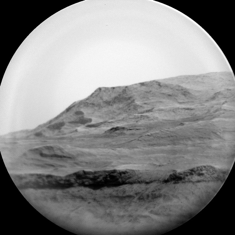 Image of distant rock outcrop on Mars
