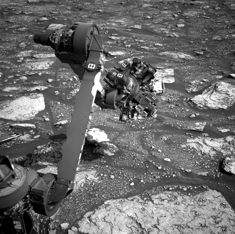 A close-up view of Curiosity's arm at work on Mars