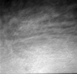 This animation shows three images taken on the morning of Sol 16. Between frames, you can see the clouds moving across the screen from the northeast. The clouds are thought to be about 10 miles high and moving in 15 mile per hour winds.