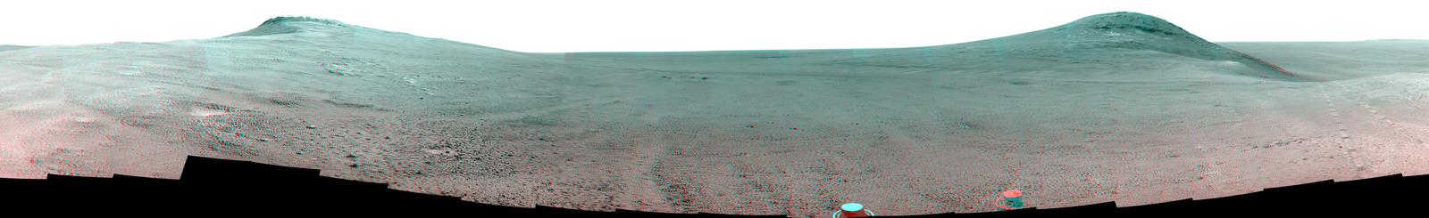 This June 2017 stereo  view from NASA's Opportunity Mars rover shows the area just above  "Perseverance Valley" on the rim of a crater. It combines images from  the left eye and right eye of the rover's Pancam to appear three-dimensional  when seen through blue-red glasses with the red lens on the left.