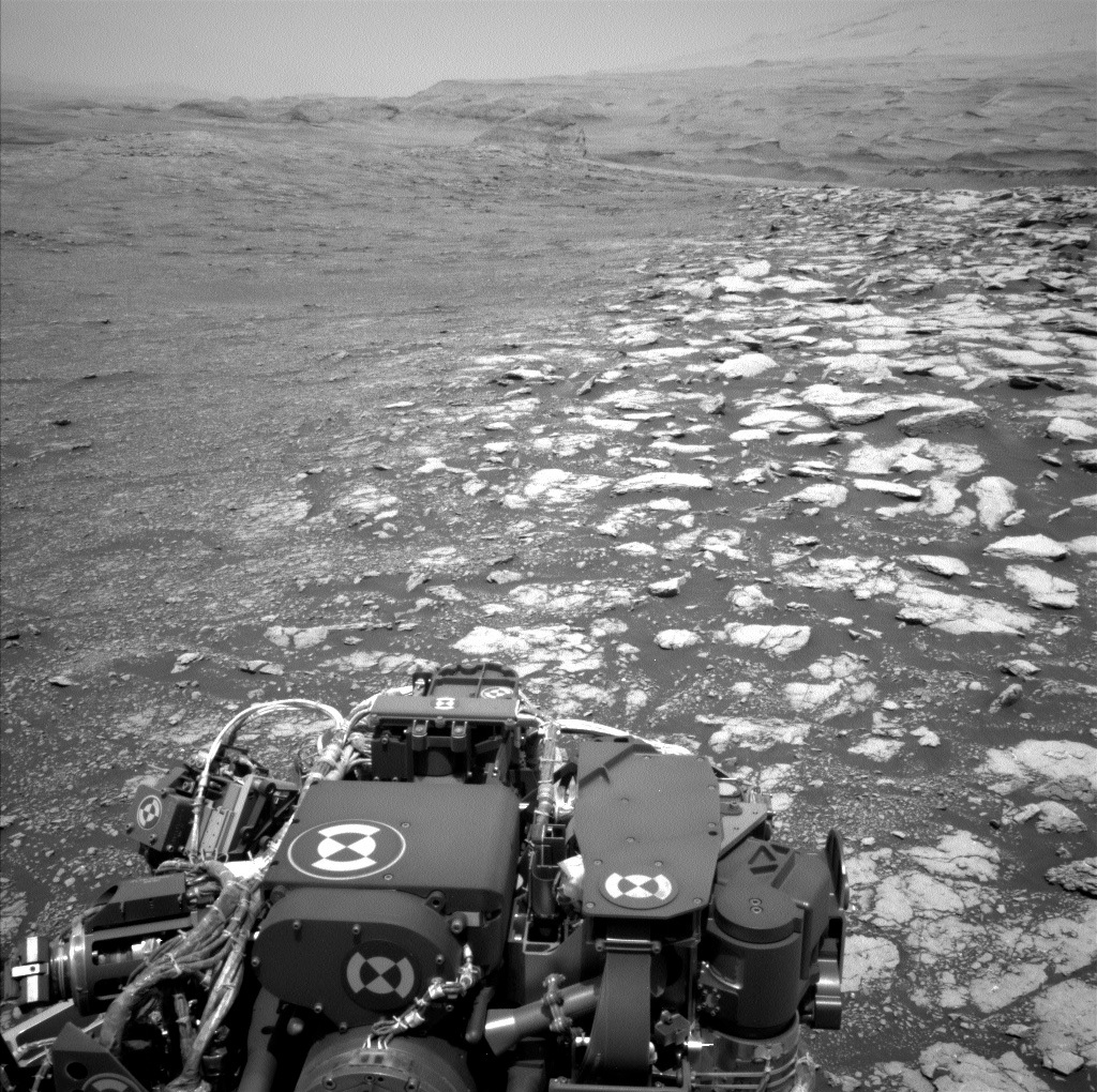 Parts of the Curiosity rover are visible in this Mars panorama