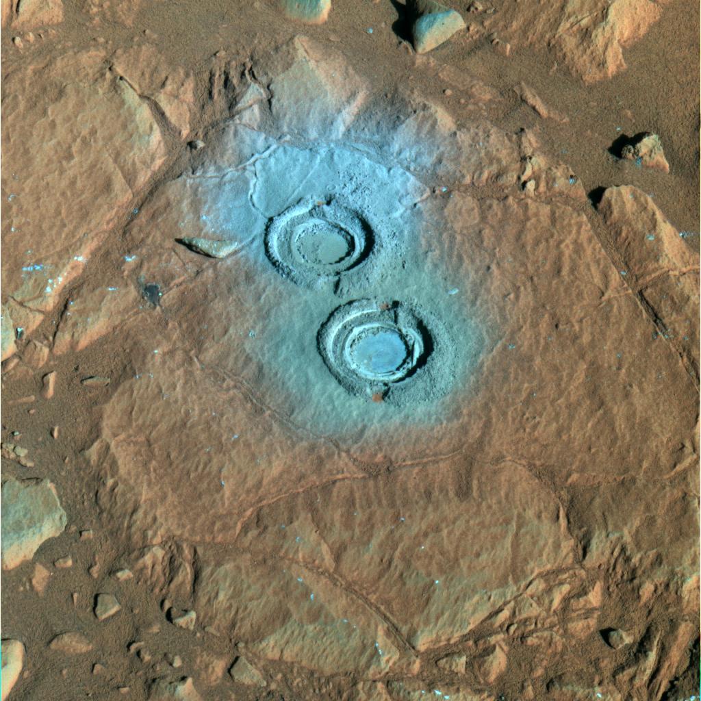 The rock abrasion tool on NASA's Mars Exploration Rover Spirit ground two holes in a relatively soft rock called "Wooly Patch" near the base of the "Columbia Hills" inside Gusev Crater on Mars.
