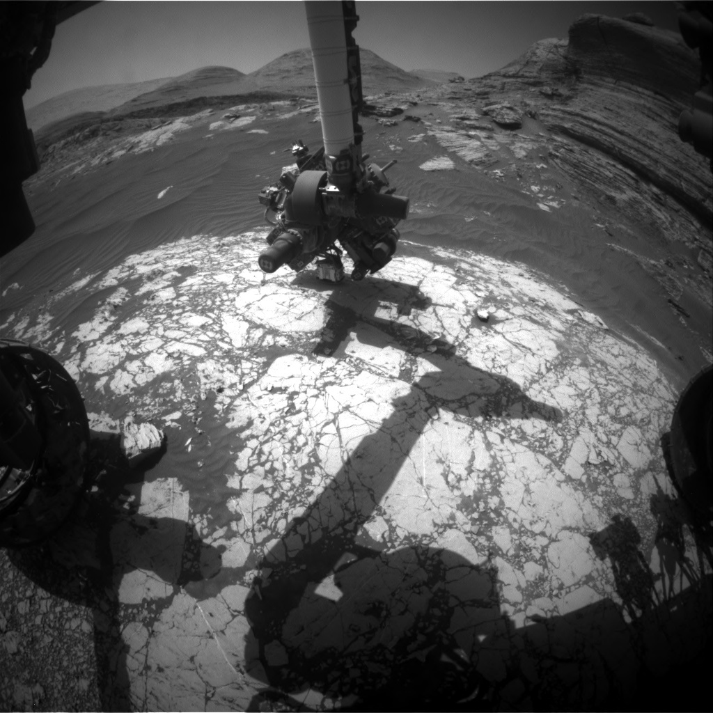 This image was taken by the Front Hazard Avoidance Camera onboard NASA's Mars rover Curiosity on Sol 3054. It shows APXS measuring the target 'Nontron.'