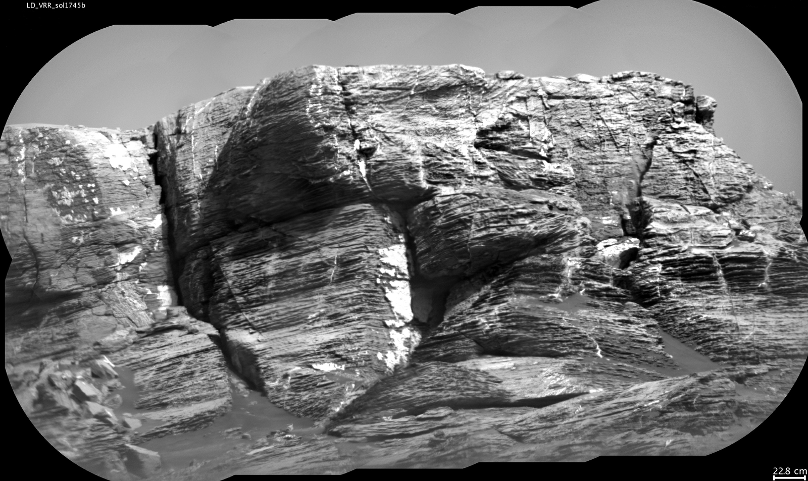 This view of "Vera Rubin Ridge" from the ChemCam instrument on NASA's Curiosity Mars rover shows sedimentary layers and fracture-filling mineral deposits. ChemCam's telescopic Remote Micro-Imager took the 10 component images of this scene on July 3, 2017, from a distance of about 377 feet.
