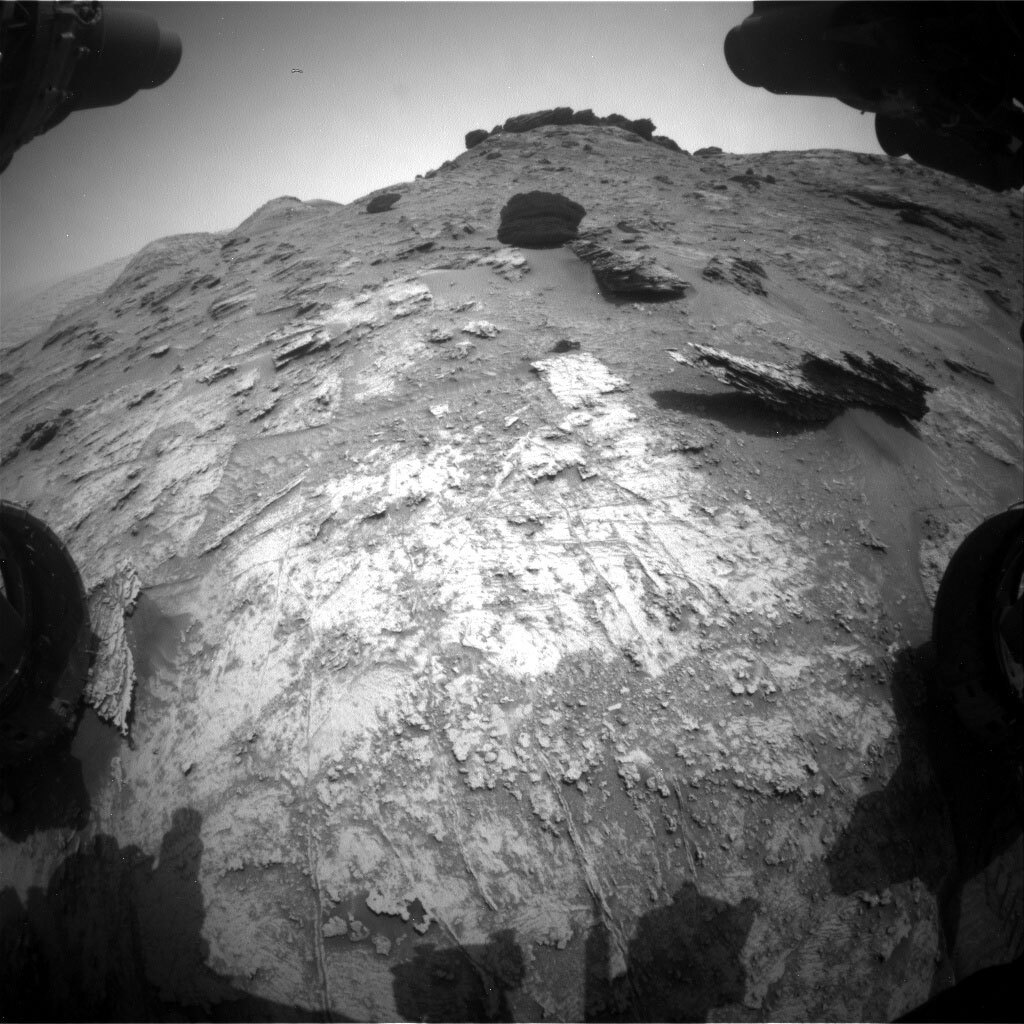 This image shows the today’s workspace, and if you look at the image in yesterday’s blog, you can make out the area in the distance. This image was taken by Left Navigation Camera onboard NASA's Mars rover Curiosity on Sol 3469.