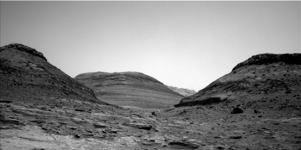 This image shows Martian terrain ahead of Curiosity and was taken on sol 3504.