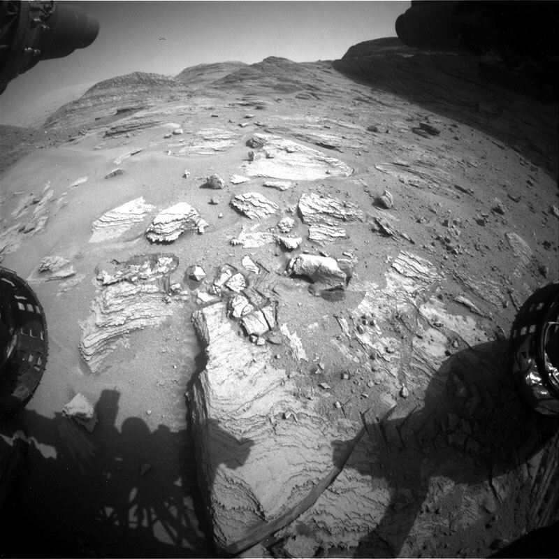 Image of sand and rocks taken by Front Hazard Avoidance Camera (Front Hazcam) onboard NASA's Mars rover Curiosity on Sol 3558.