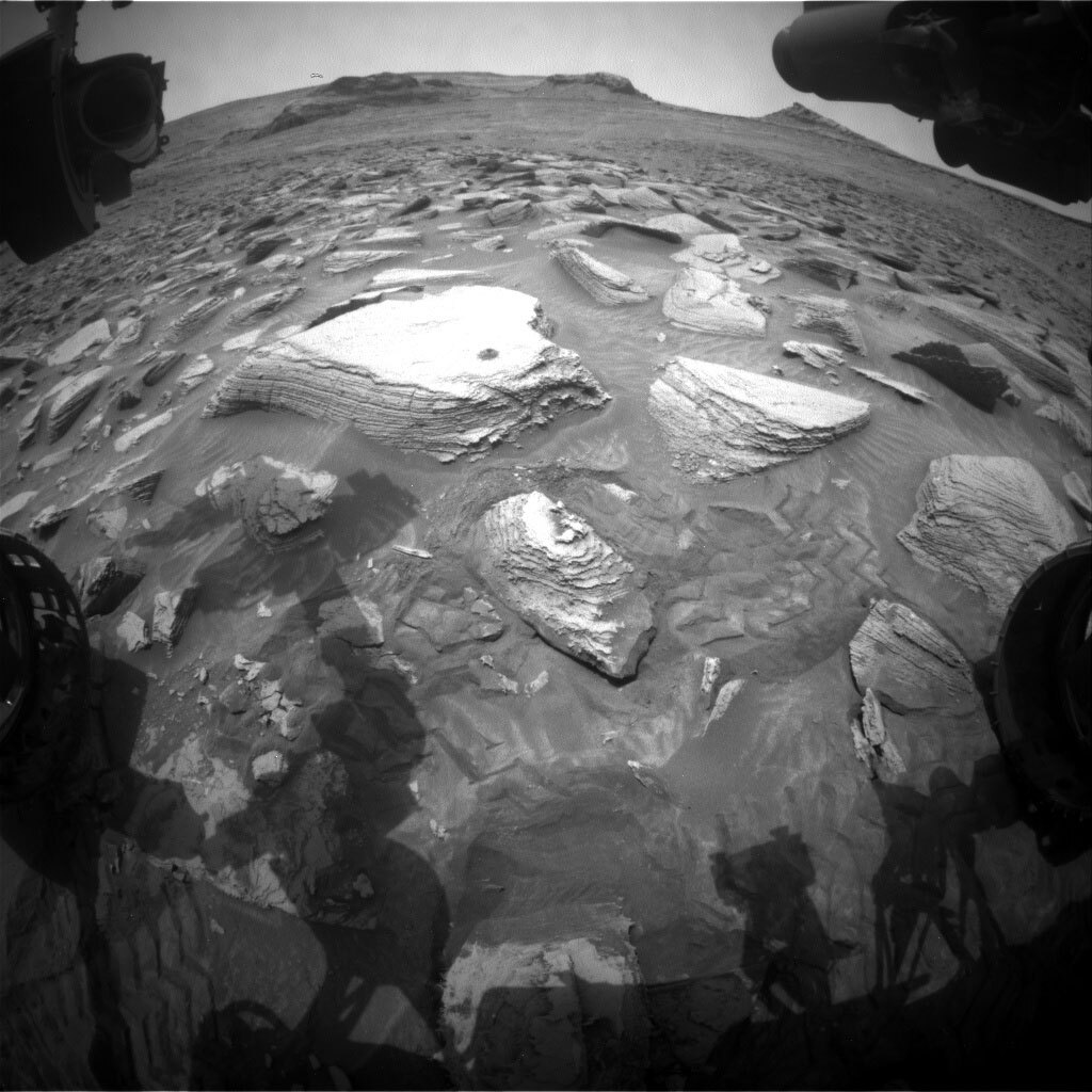 This image, showing the new drill hole #36, was taken by Front Hazard Avoidance Camera (Front Hazcam) onboard NASA's Mars rover Curiosity on Sol 3612.