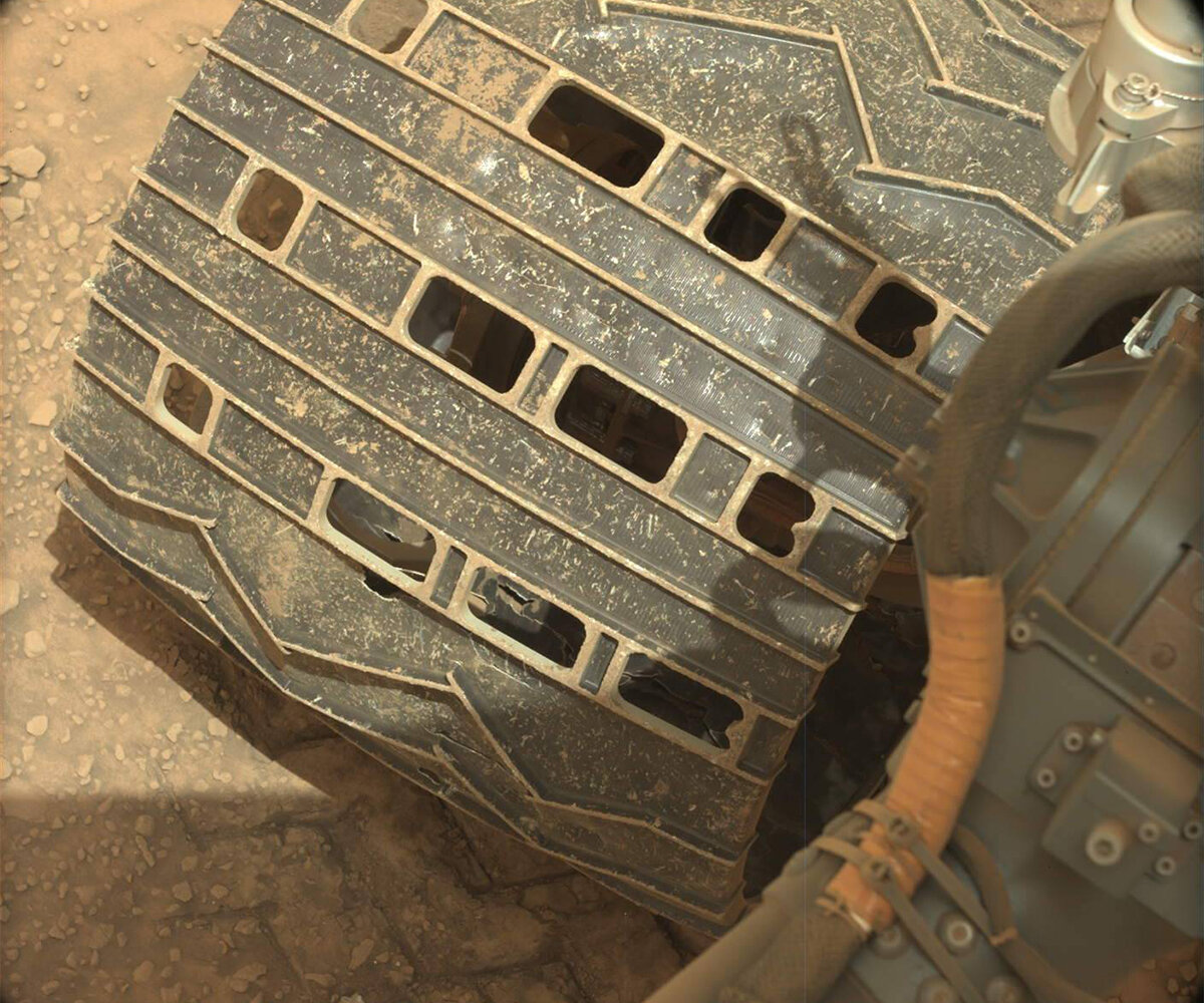This image shows Curiosity's damaged wheel on the Mars surface and was taken on Sol 3658.