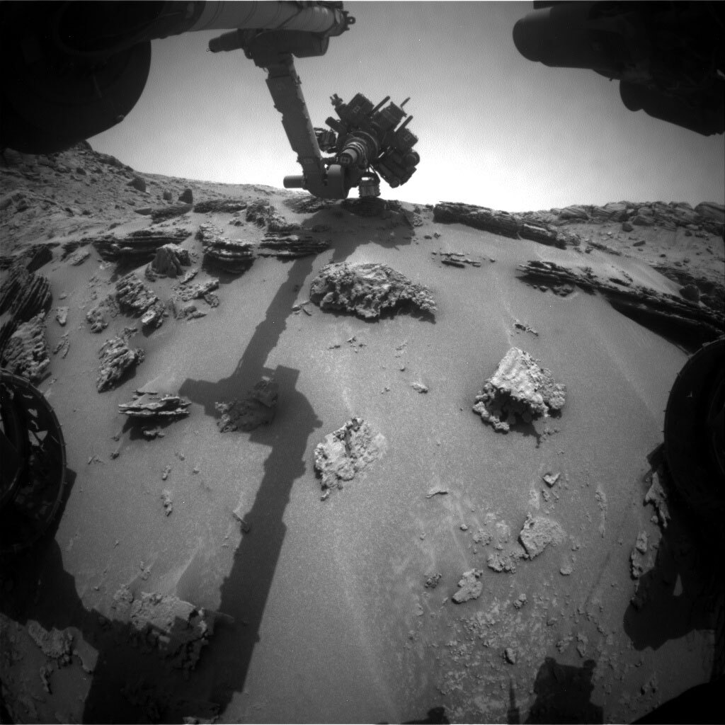 Front Hazcam image taken on Sol 3688 showing the APXS instrument on the rhythmically layered target “Tamandua.”