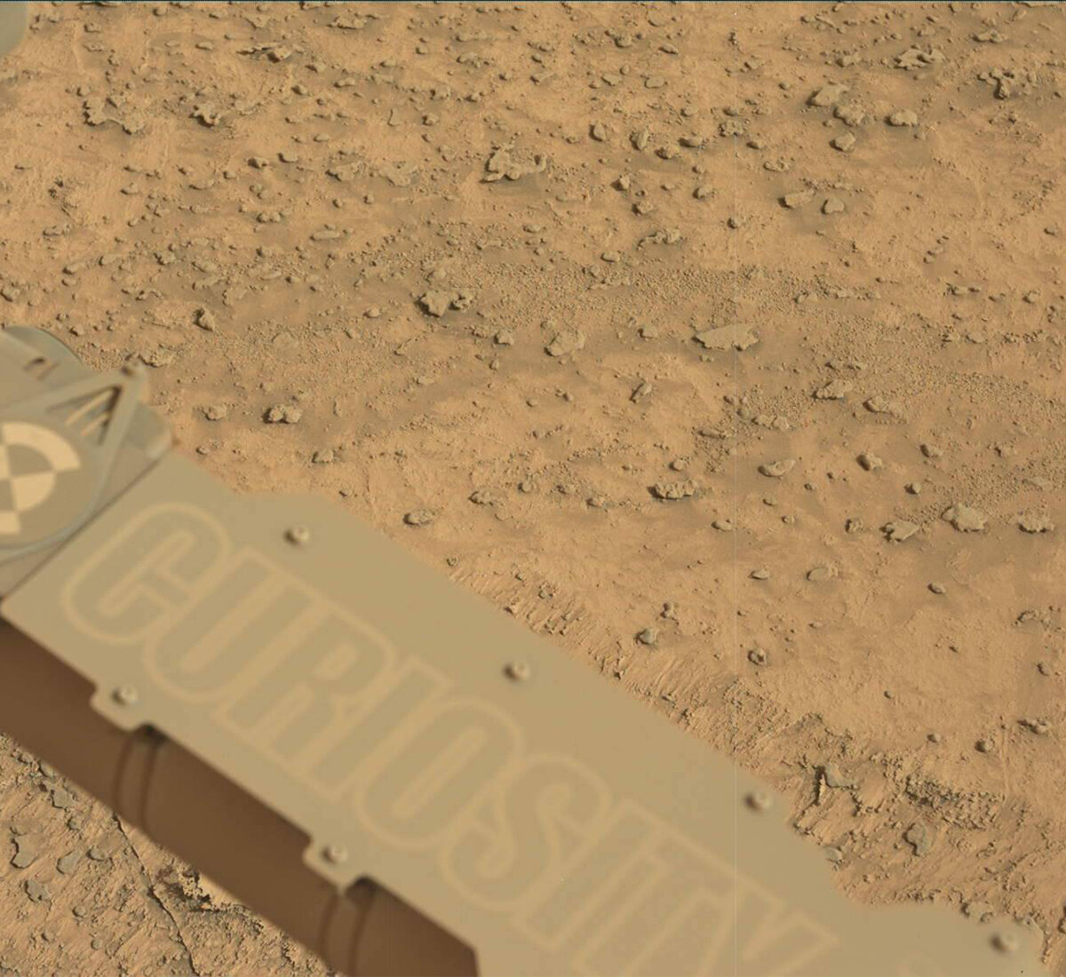 This image showing the Curiosity rover's nameplate was taken by Mast Camera (Mastcam) onboard NASA's Mars rover Curiosity on Sol 3708.