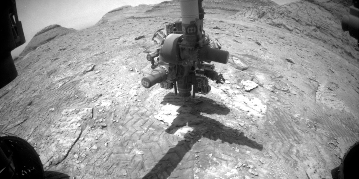 This image of Curiosity's arm above the Mars surface was taken by Front Hazard Avoidance Camera onboard the Curiosity rover on Sol 3742.