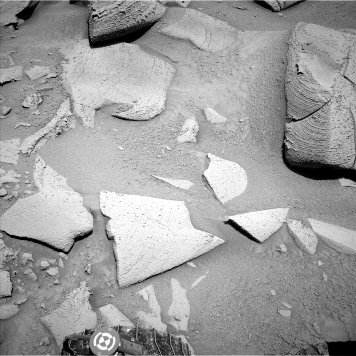 This image of smooth Martian rock formations was taken by Left Navigation Camera onboard NASA's Mars rover Curiosity on Sol 3802.