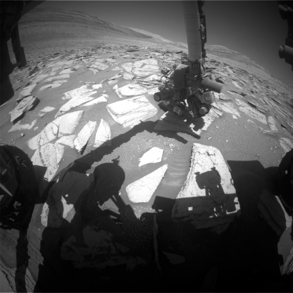 This image was taken by Front Hazard Avoidance Camera (Front Hazcam) onboard NASA's Mars rover Curiosity on Sol 3978. Credits: NASA/JPL-Caltech. Download image ›