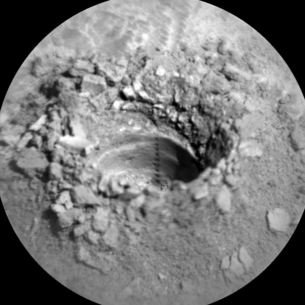 Sol 2543-2544: Dumping Dirt on its Back