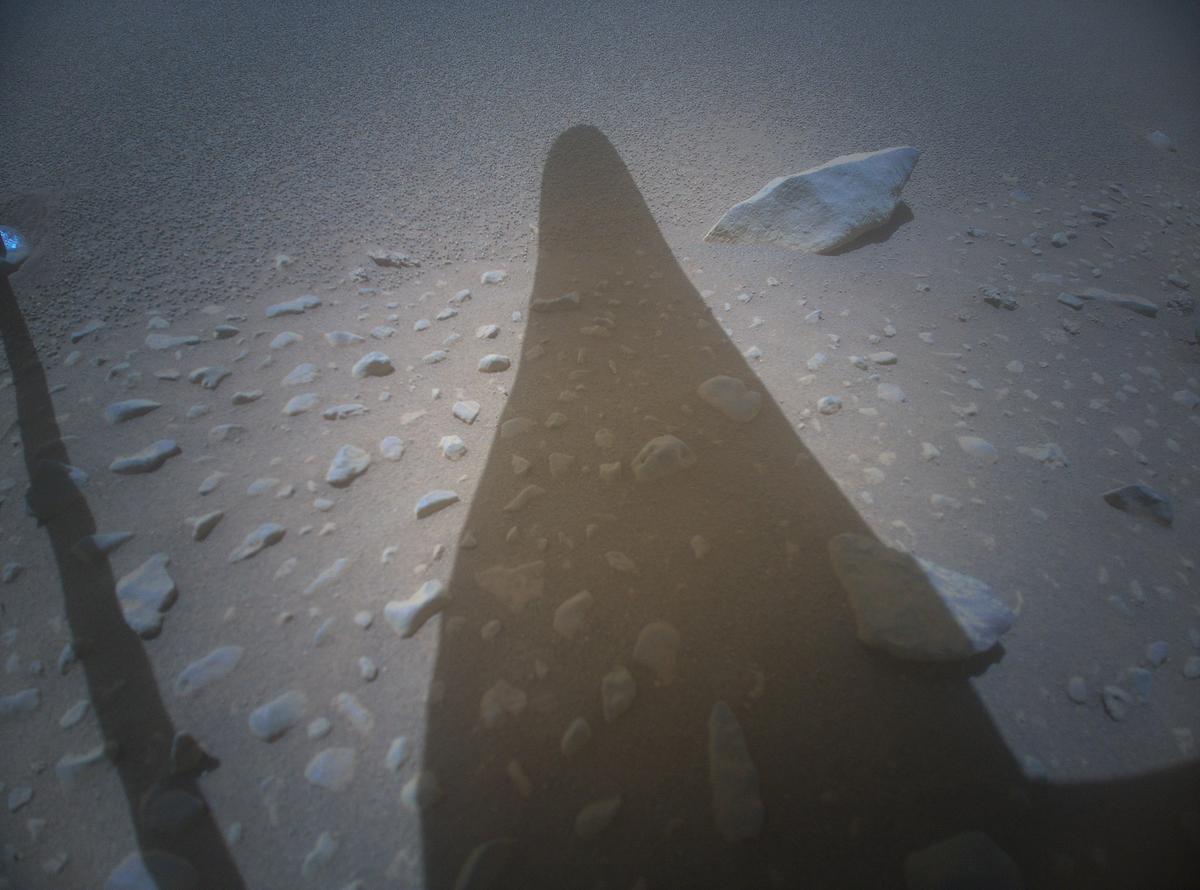 NASA's Ingenuity Mars Helicopter acquired this image using its high-resolution color camera. This camera is mounted in the helicopter's fuselage and pointed approximately 22 degrees below the horizon.