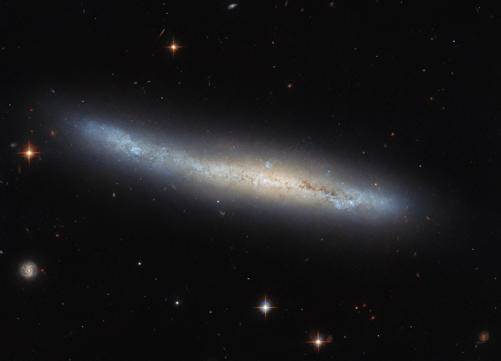 Hubble Sees a Spiral Galaxy Edge-On - NASA Science