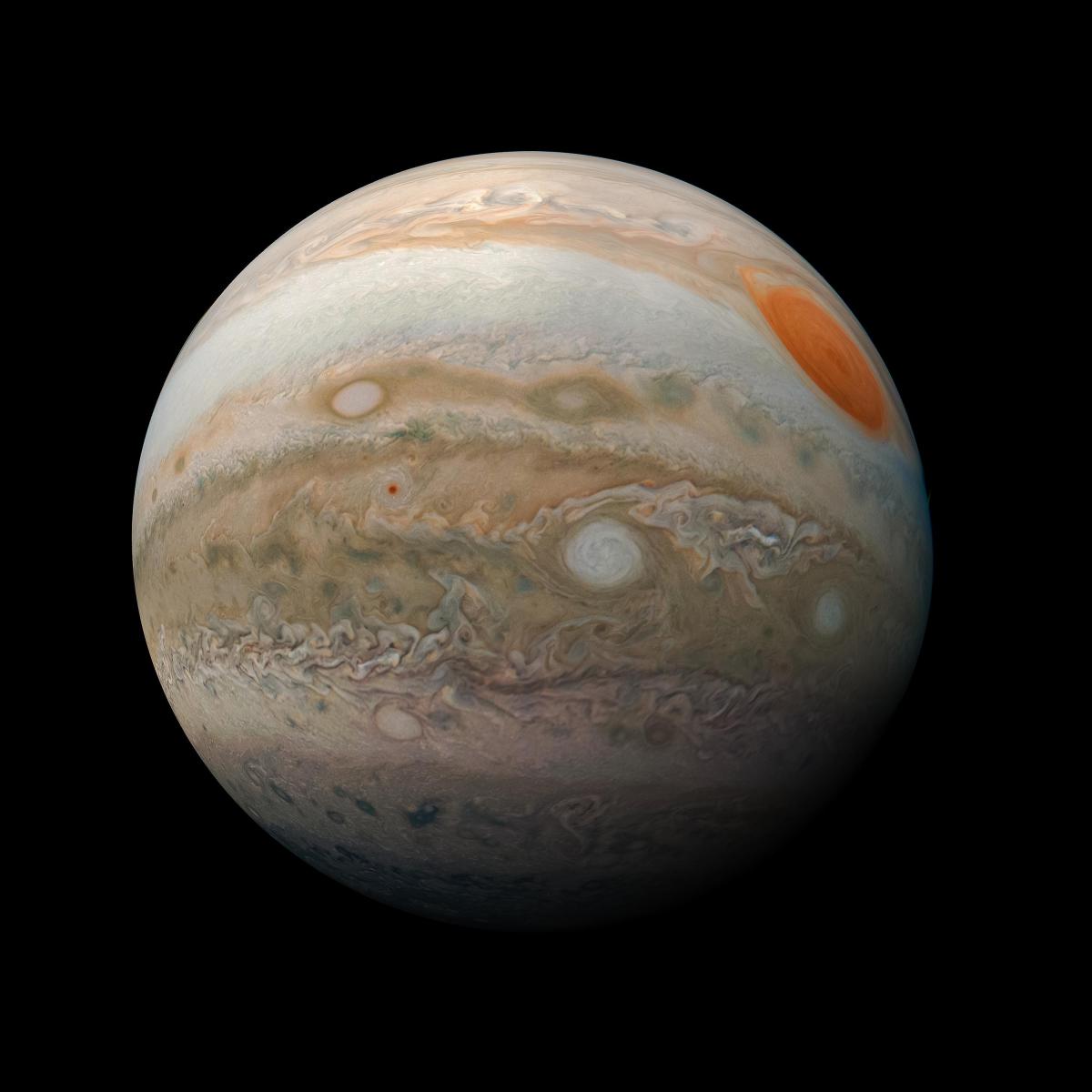 Jupiter full disc from NASA Juno spacecraft showing banded cloud belts, Great Red Spot and swirling atmospheric features in vivid detail