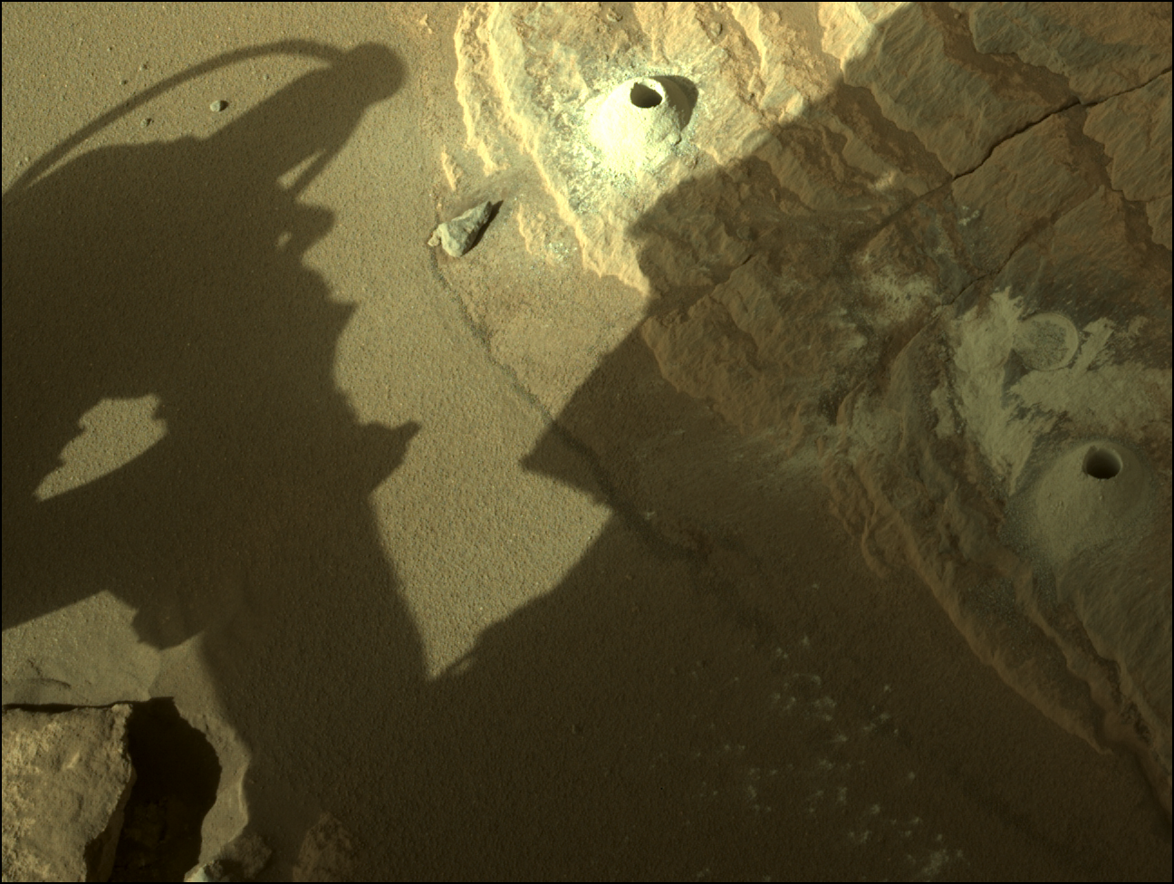 Image taken was taken by the Mars Perseverance rover after collecting the rock sample 5 at Coulettes.