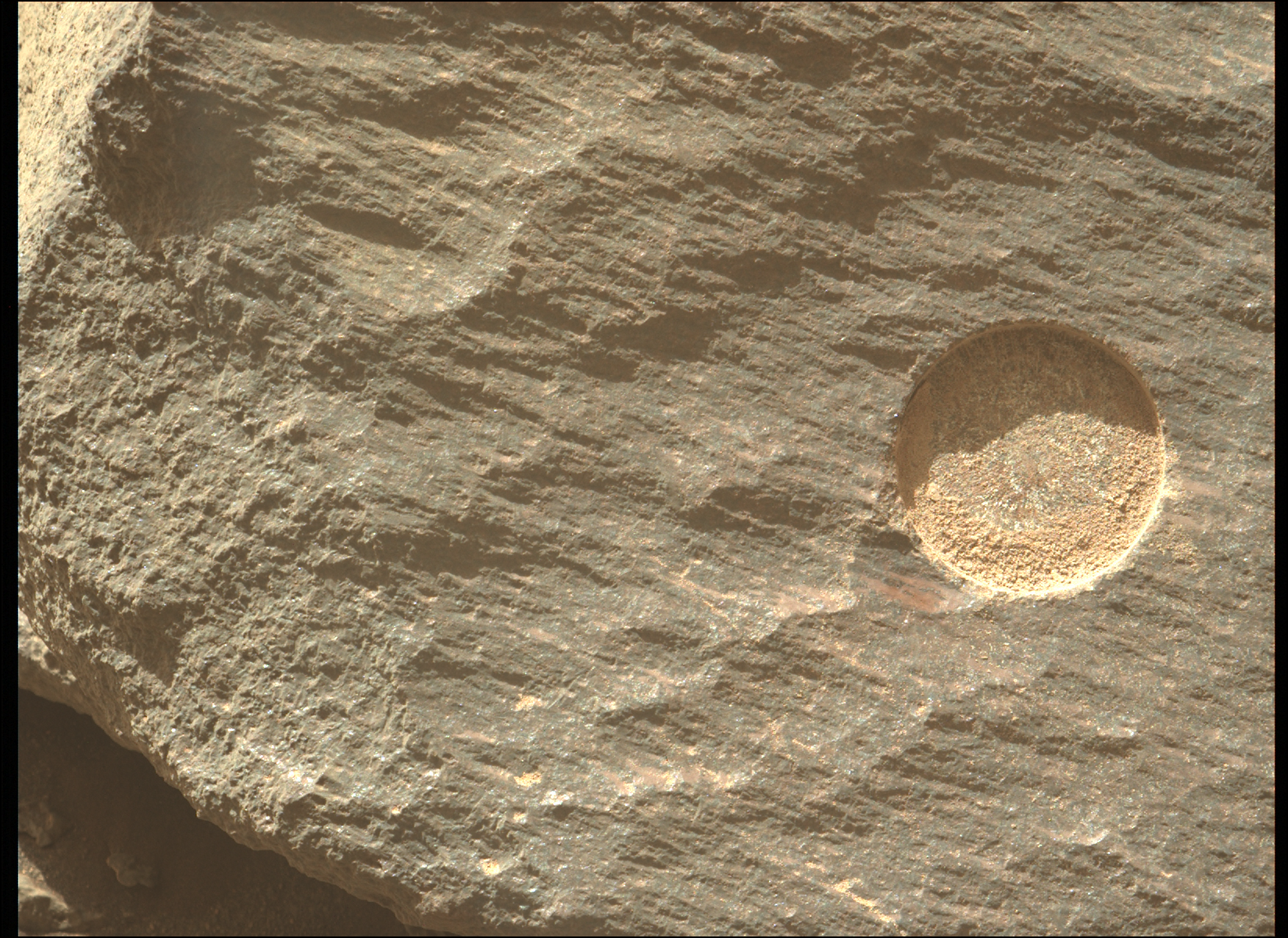 Image taken was taken by the Mars Perseverance rover displaying the abrasion patch prior to collecting the rock sample 9 at Atsá (aka "Atsah").