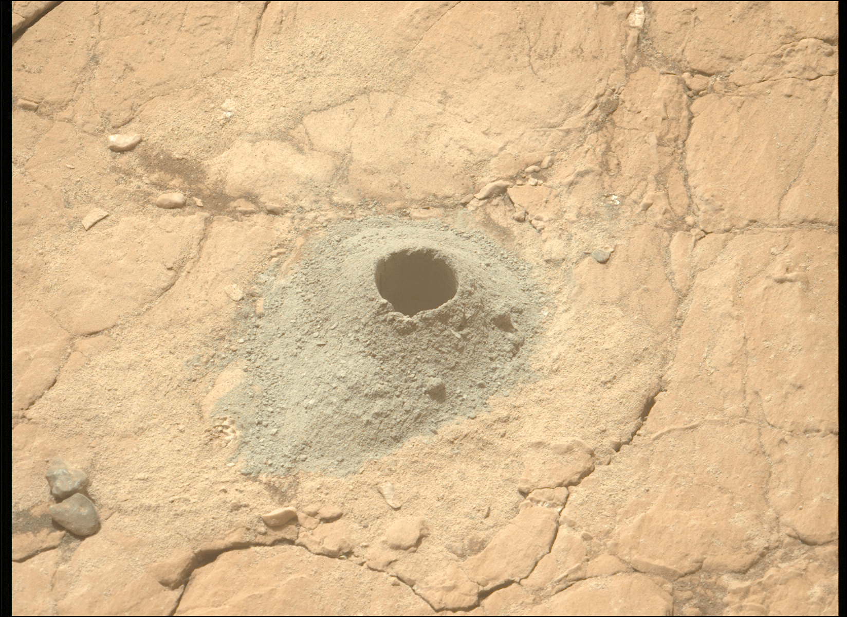 Image taken was taken by the Mars Perseverance rover after collecting the rock sample 16 at Kukaklek.