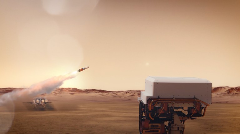 The Mars Perseverance rover is looking over a horizon of red and brown rocks and dunes watching a rocket launching from the surface of Mars.