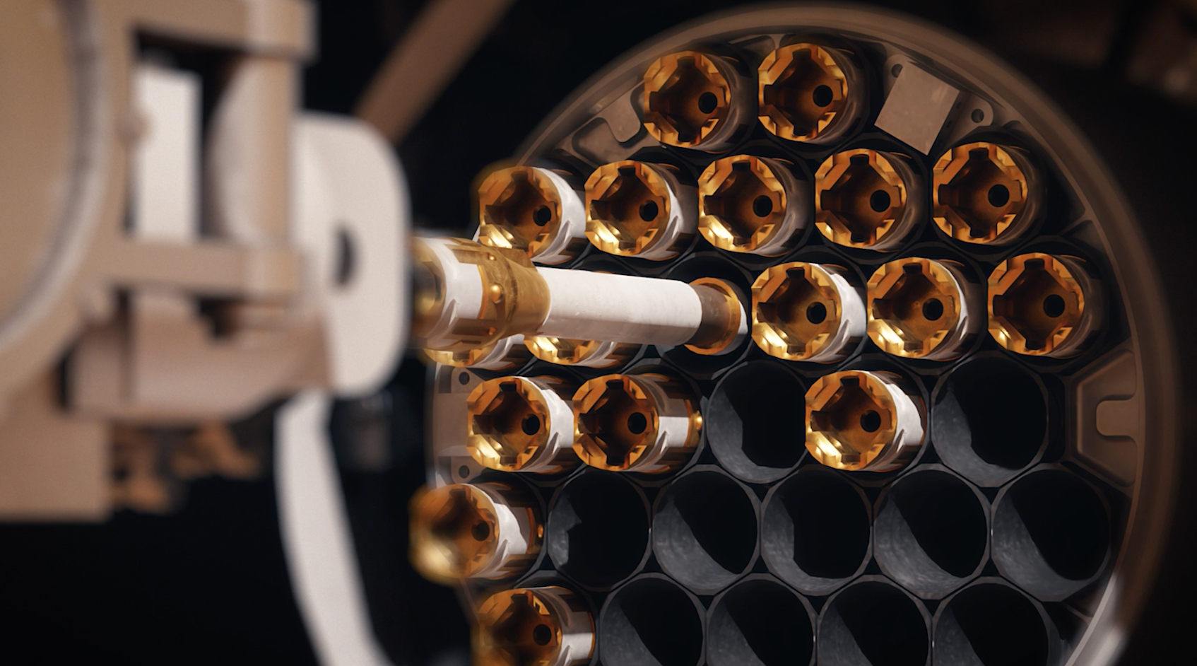 On the left of the image a Sample Transfer Arm is loading white and gold sealed sample tubes into the Orbiting Sample container on the Mars Ascent Vehicle.