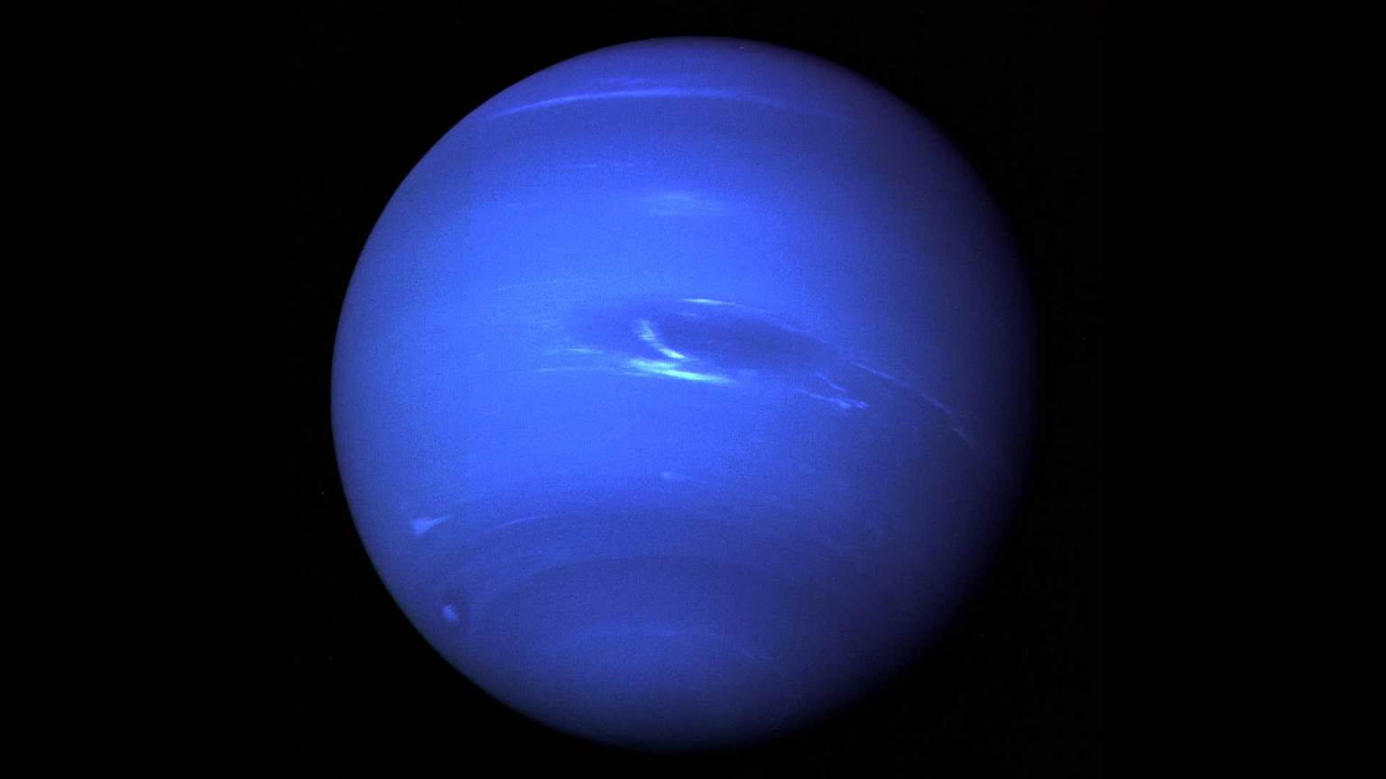 Neptune is blue and banded with clouds and storms.