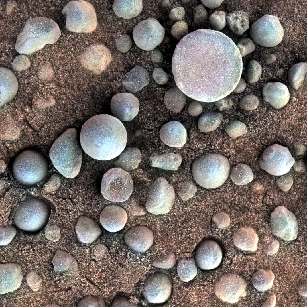 A collection of spherical pebbles on Mars.
