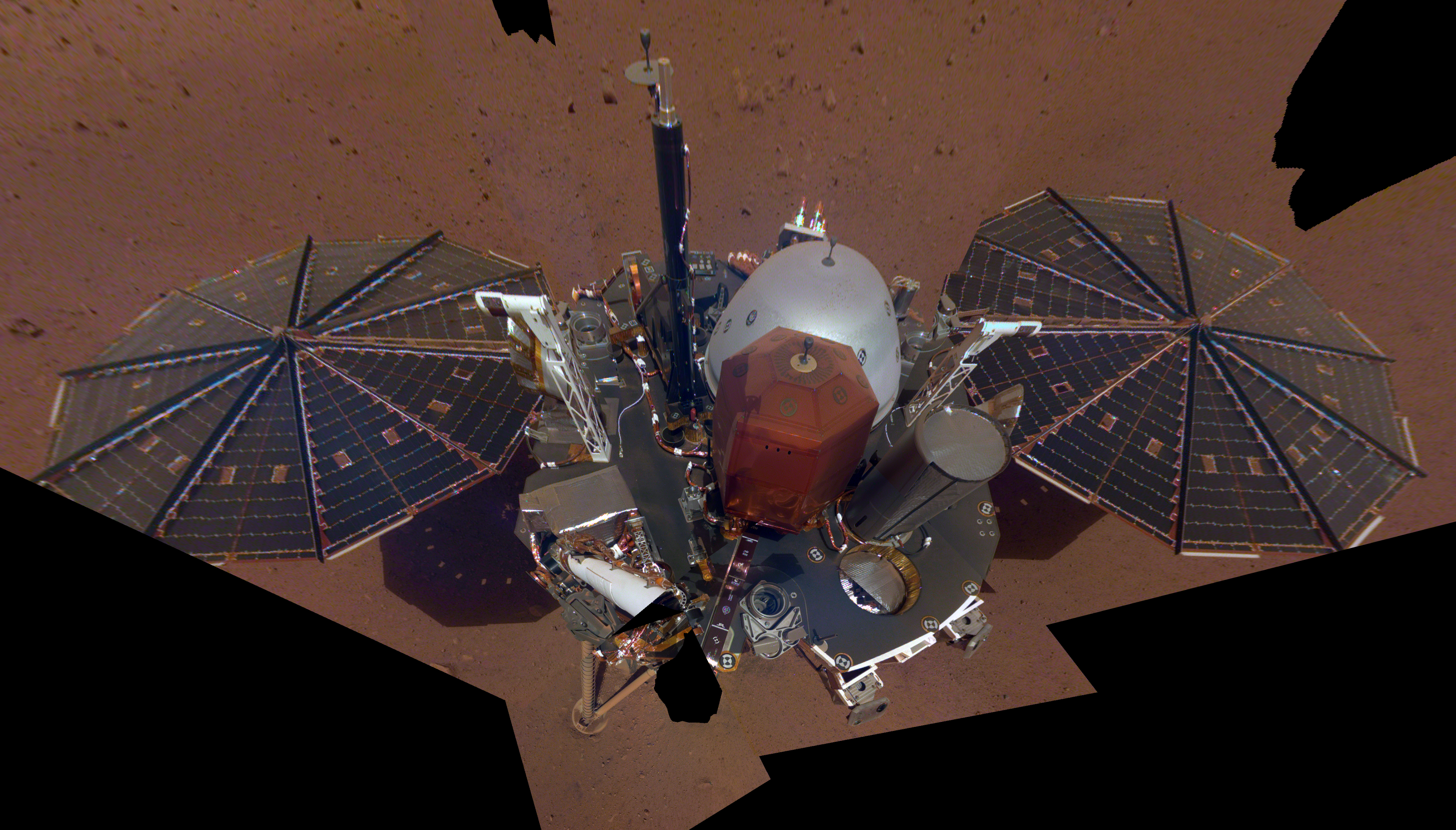 This composite image shows the entire InSight lander on the surface of Mars.