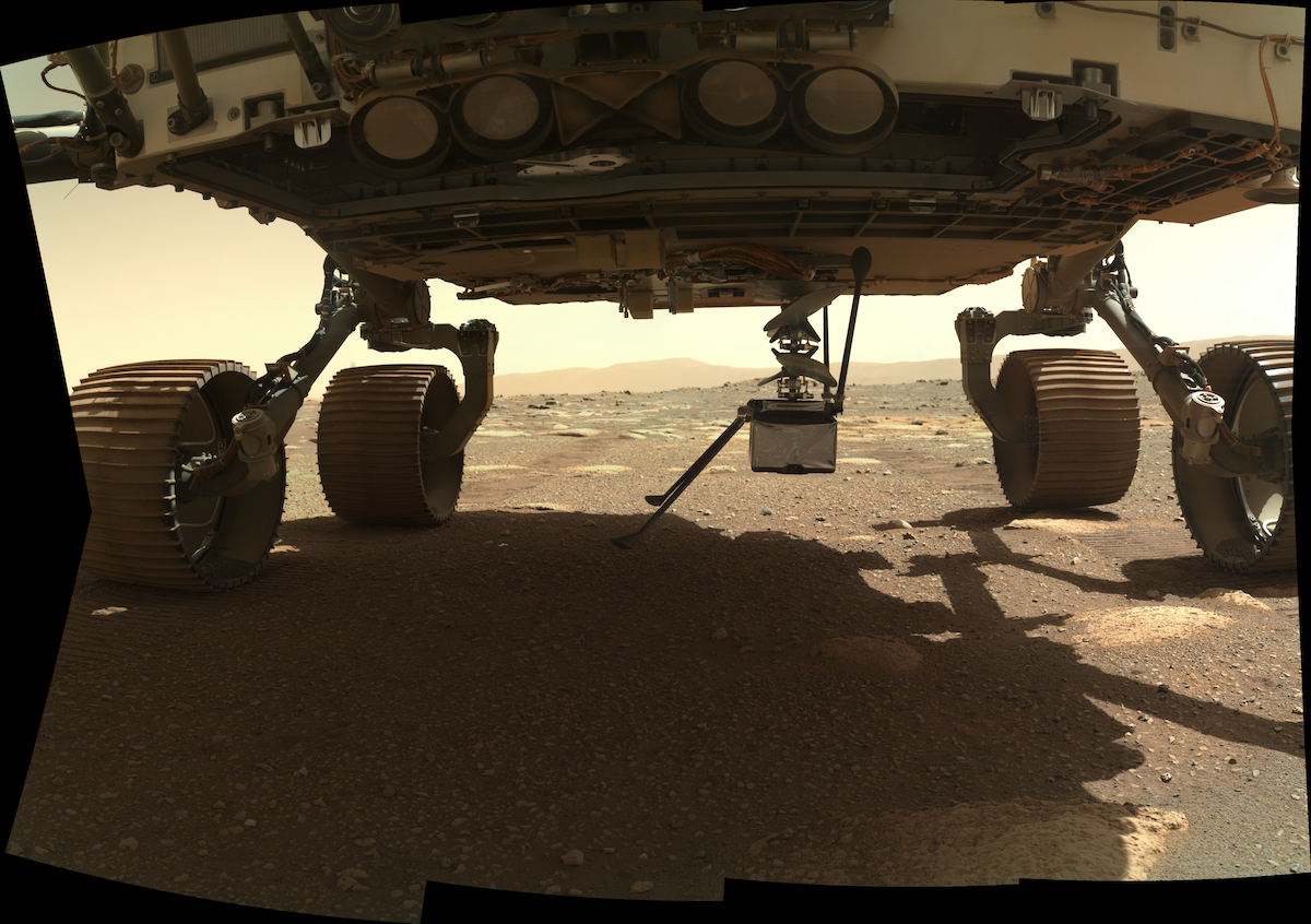 Wheels of Ingenuity Helicopter touching the ground on the surface of Mars