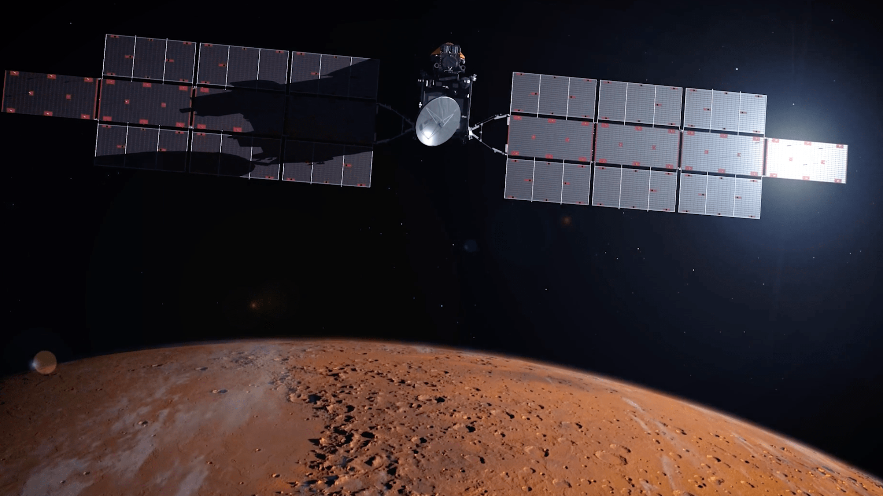 A boxy spacecraft with wide solar panels is depicted over Mars.