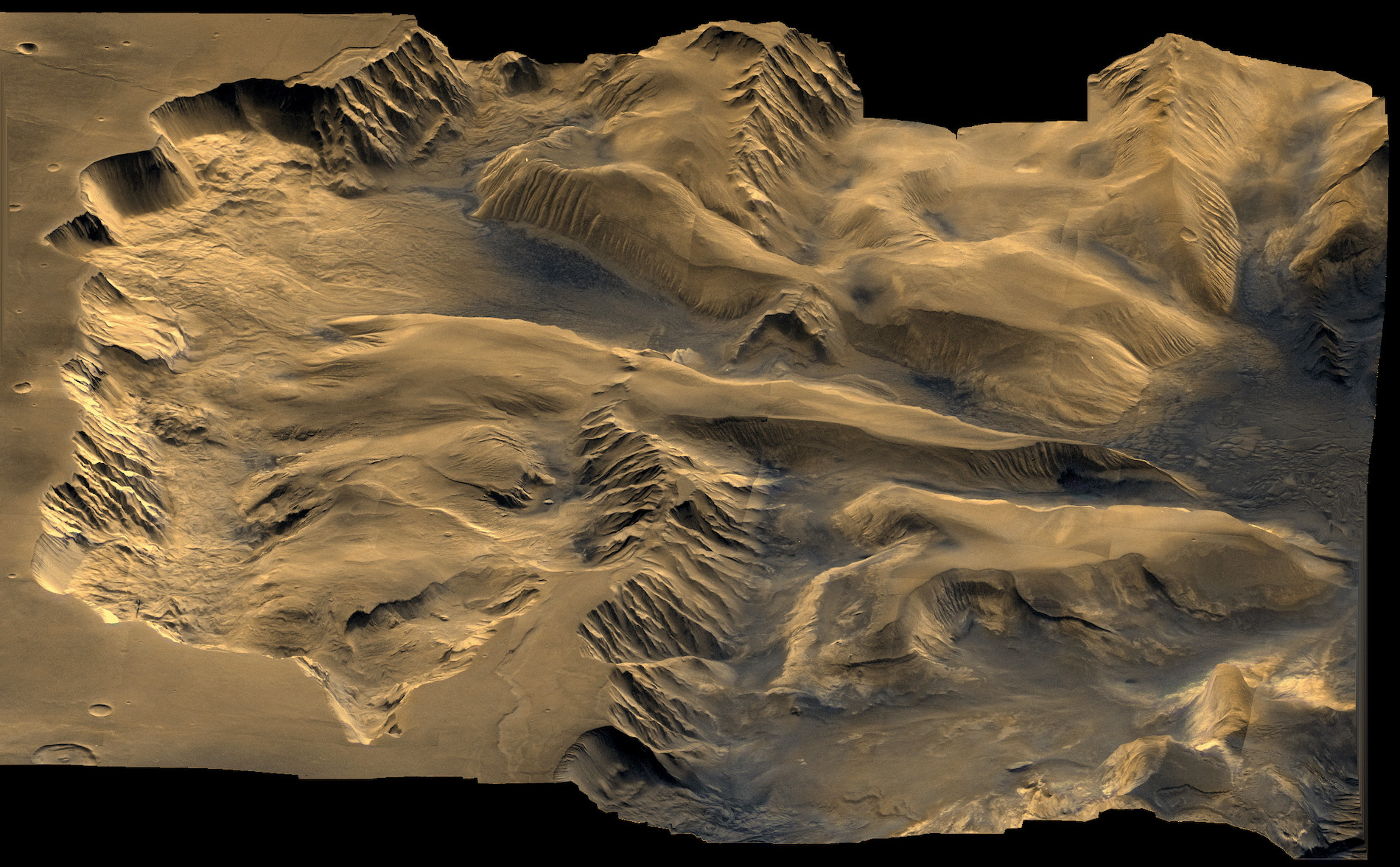 Oblique color mosaic of Candor Chasma on Mars looking from the west. This color mosaic of Viking Orbiter 1 and 2 images showing Candor Chasma, part of the Valles Marineris system on Mars. This oblique view is looking from the west over the 800 km wide chasm, which is centered at about 6.5 S, 71. W. The walls and floor show evidence of erosion and mass wasting and complex geomorphology.