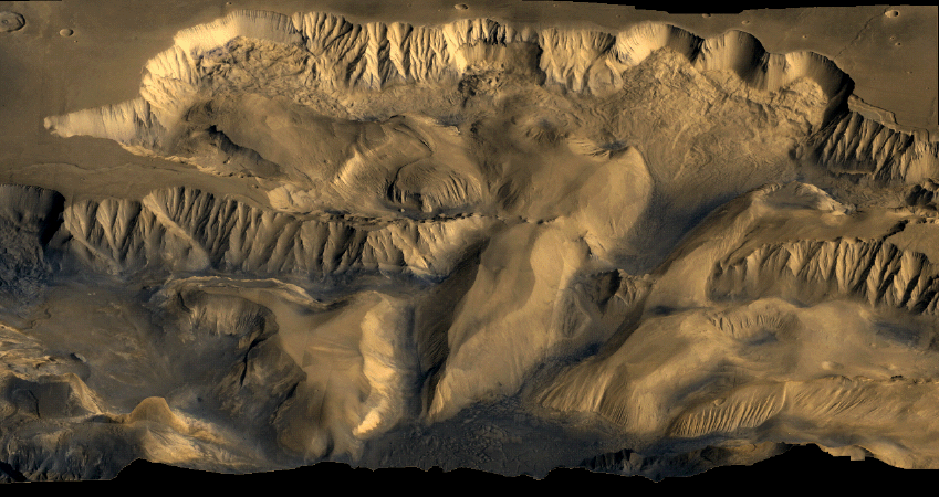 Color mosaic of Viking Orbiter 1 and 2 images showing Candor Chasma, part of the Valles Marineris system on Mars.