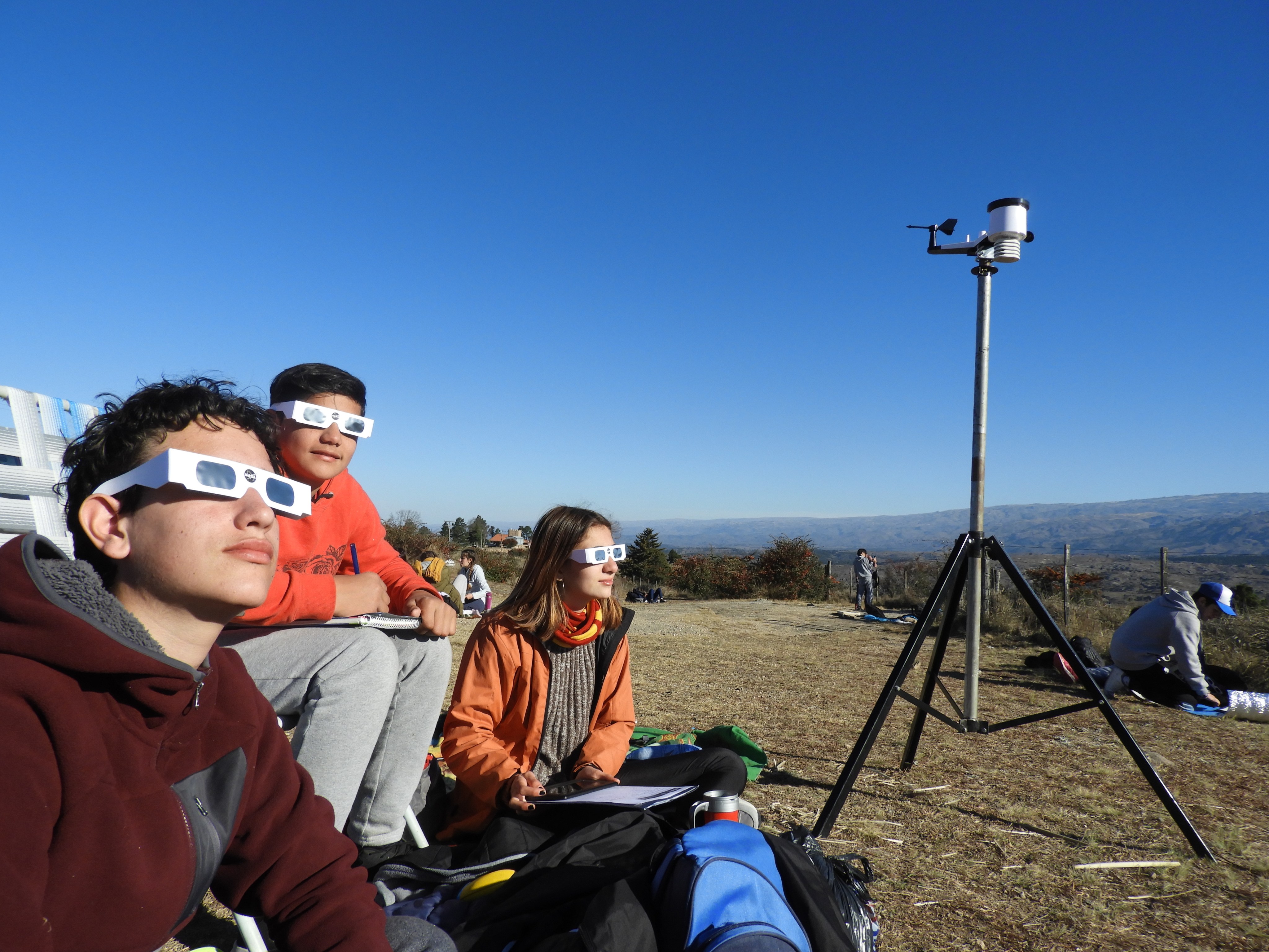 Argentine students gather cloud observations and temperature data to upload through the GLOBE Eclipse tool during the eclipse that crossed South America on July 2, 2019.