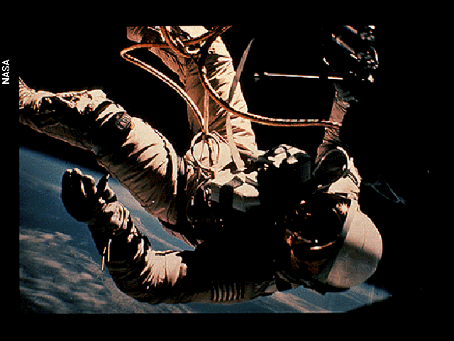 The astronaut in space image is one of the pictures electronically placed on the phonograph records which are carried onboard the Voyager 1 and 2 spacecraft.