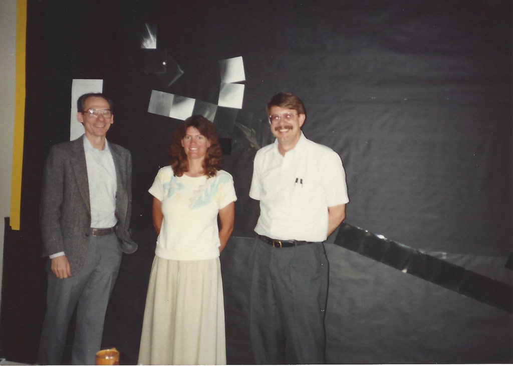 Candice Hansen standing between two colleagues