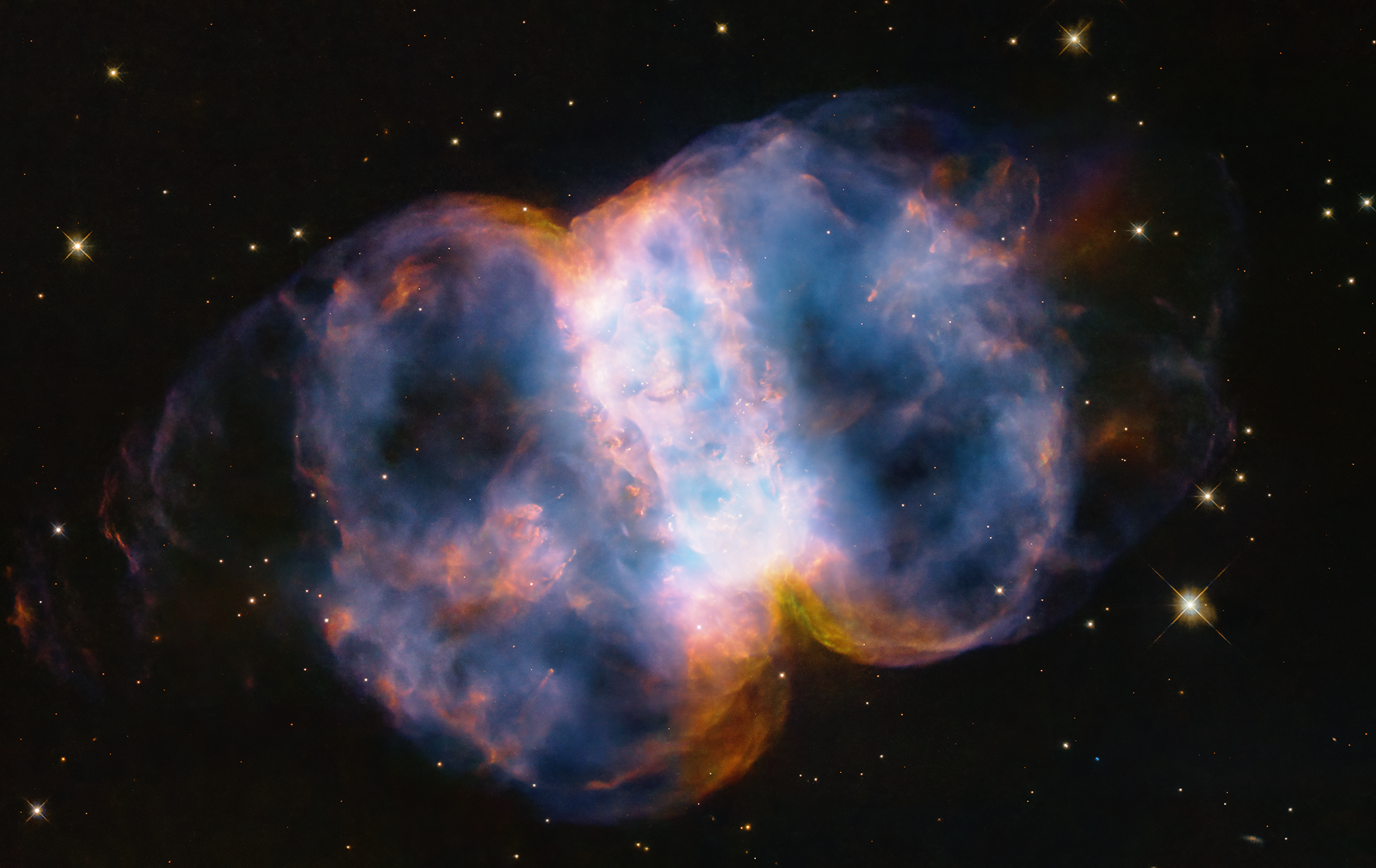 Hubble Celebrates 34th Anniversary with a Look at the Little Dumbbell Nebula