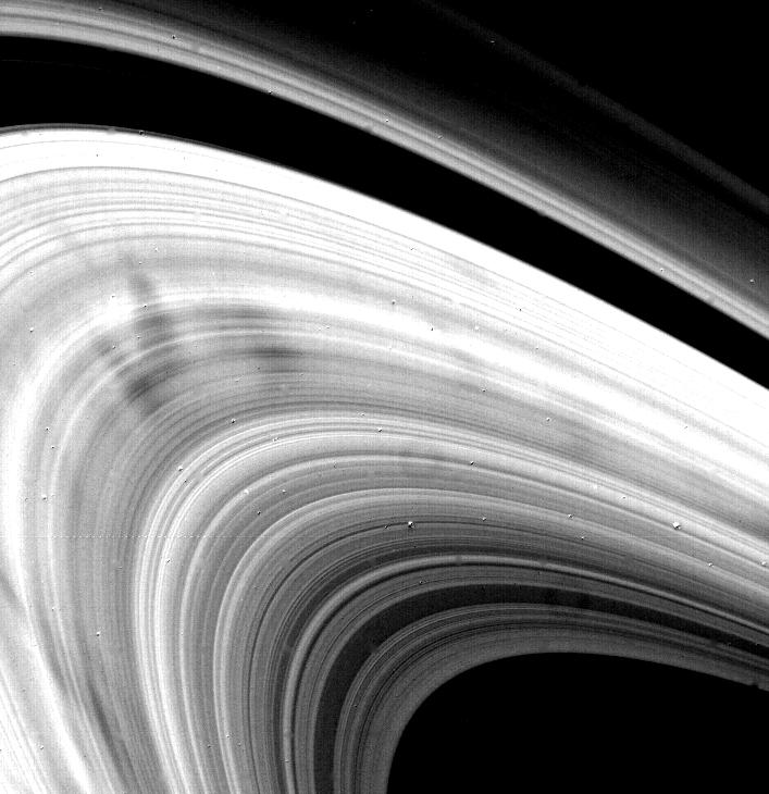 Hundreds of rings are packed together in a graceful circle around Saturn.