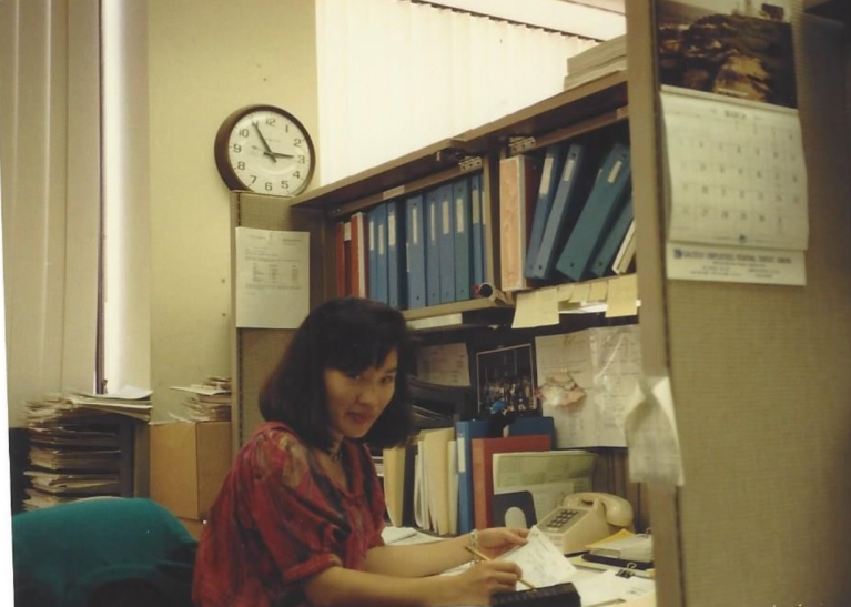 A woman working at her desk