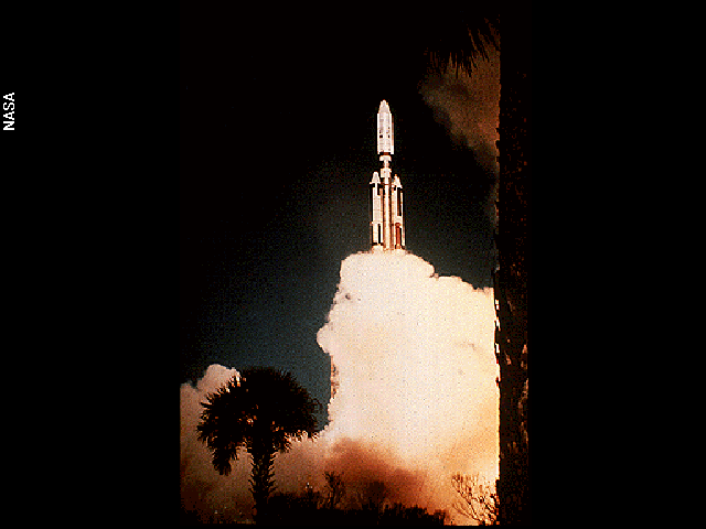 A space shuttle launching into the sky above a cloud of smoke