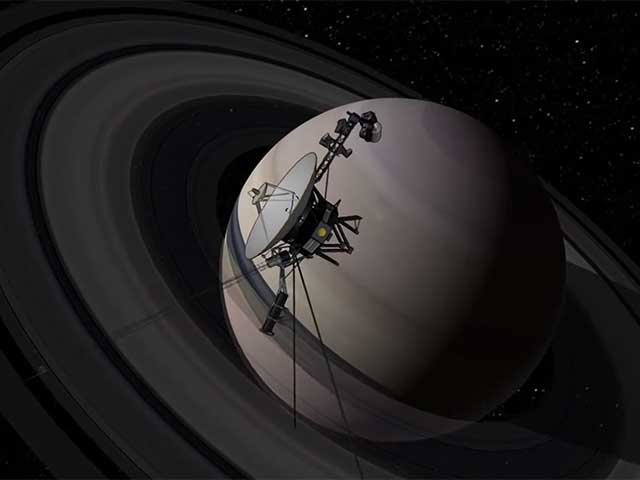 Computer-generated view of Voyager at Saturn.