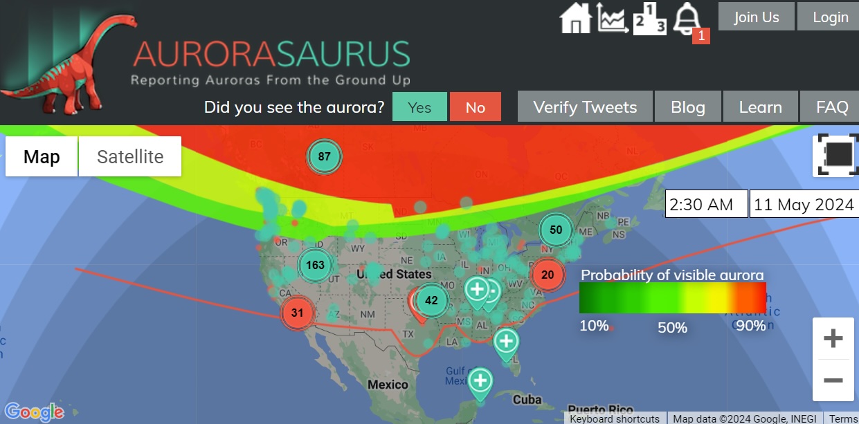 A computer screen still frame of the Aurorasaurus application showing a map of the US with green and red dots indicating the probability of a visible aurora.