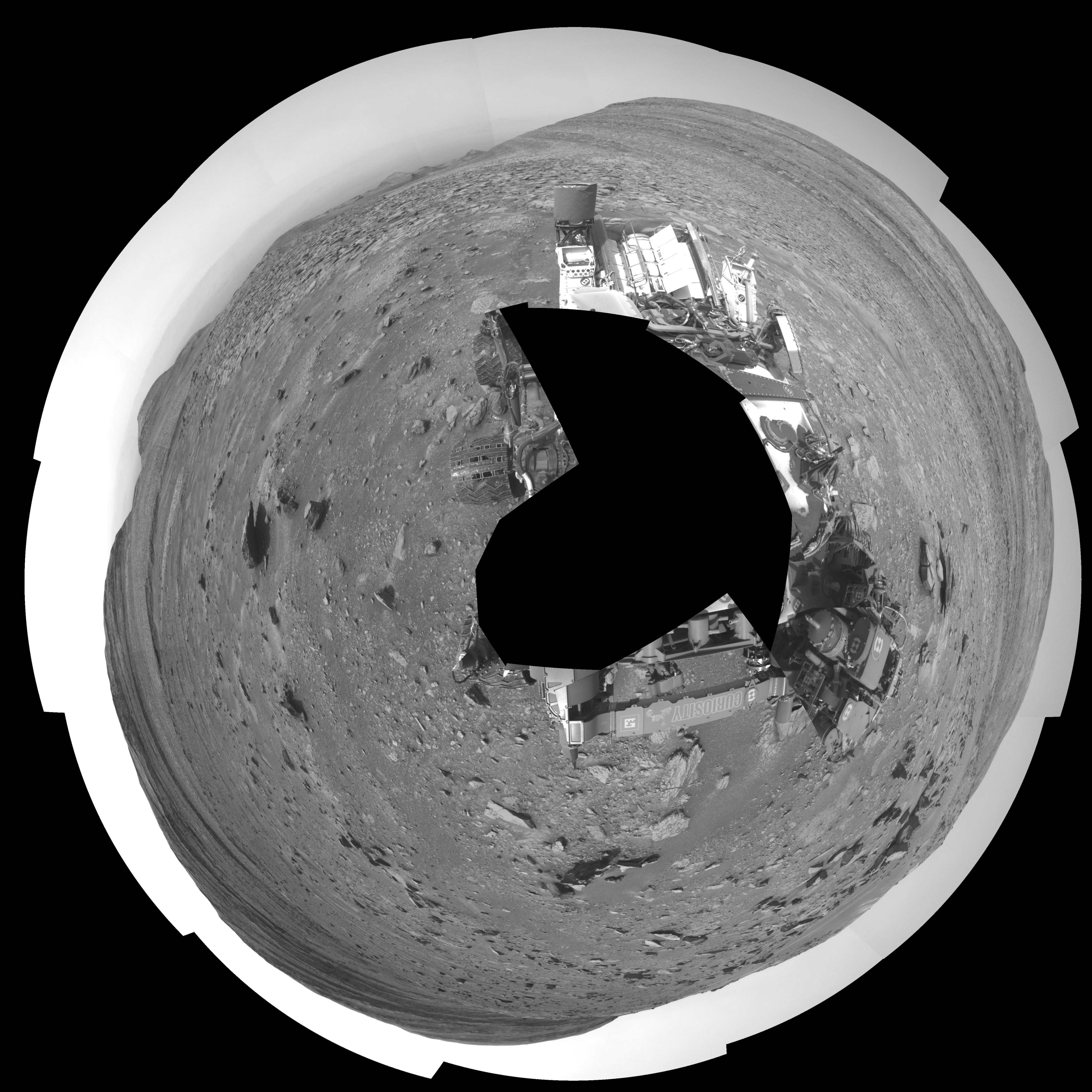 The seam-corrected mosaic provides a polar stereographic projection panorama of the Martian surface with 0 degrees azimuth (measured clockwise from north) at the top of the image.