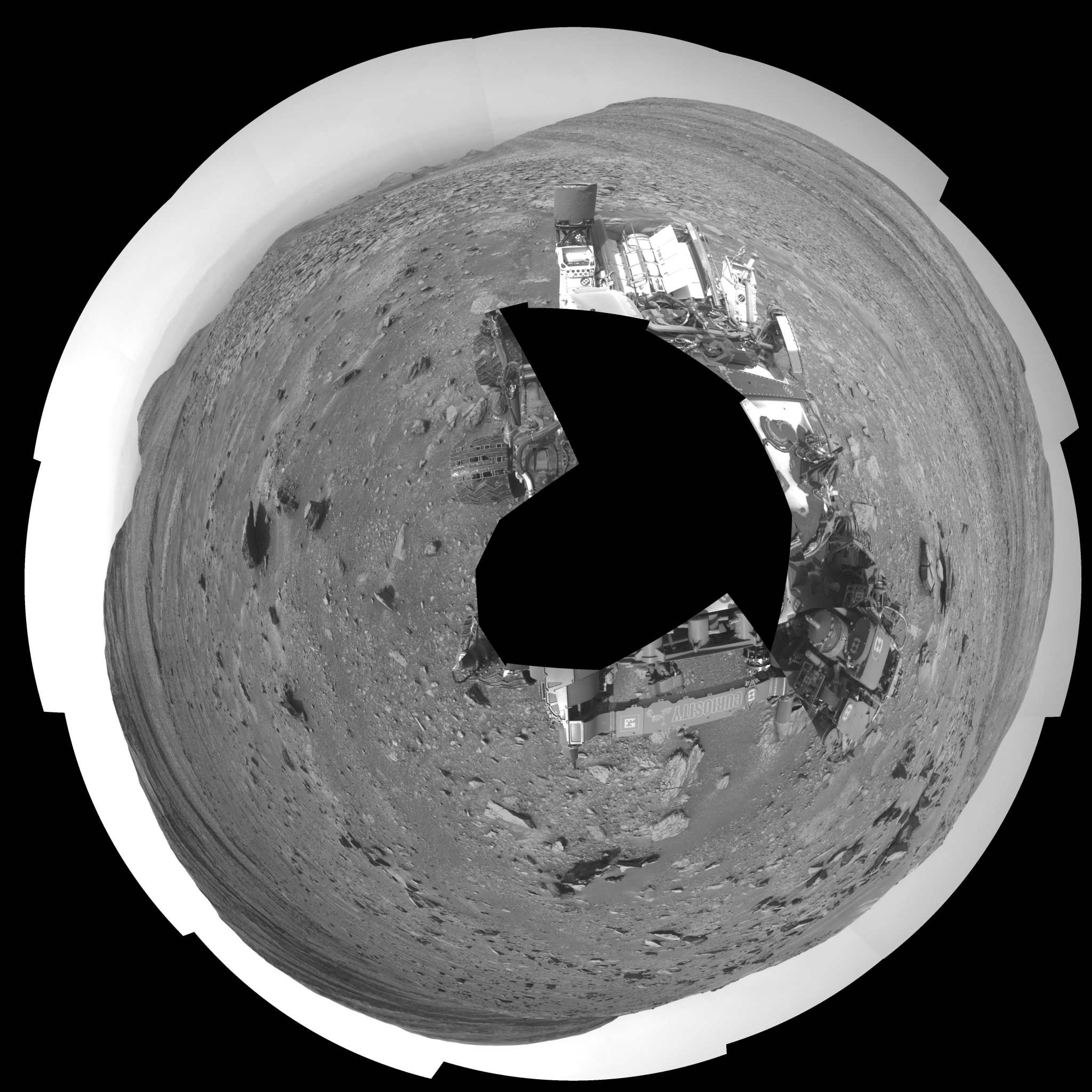 The seam-corrected mosaic provides a polar stereographic projection panorama of the Martian surface with 0 degrees azimuth (measured clockwise from north) at the top of the image.