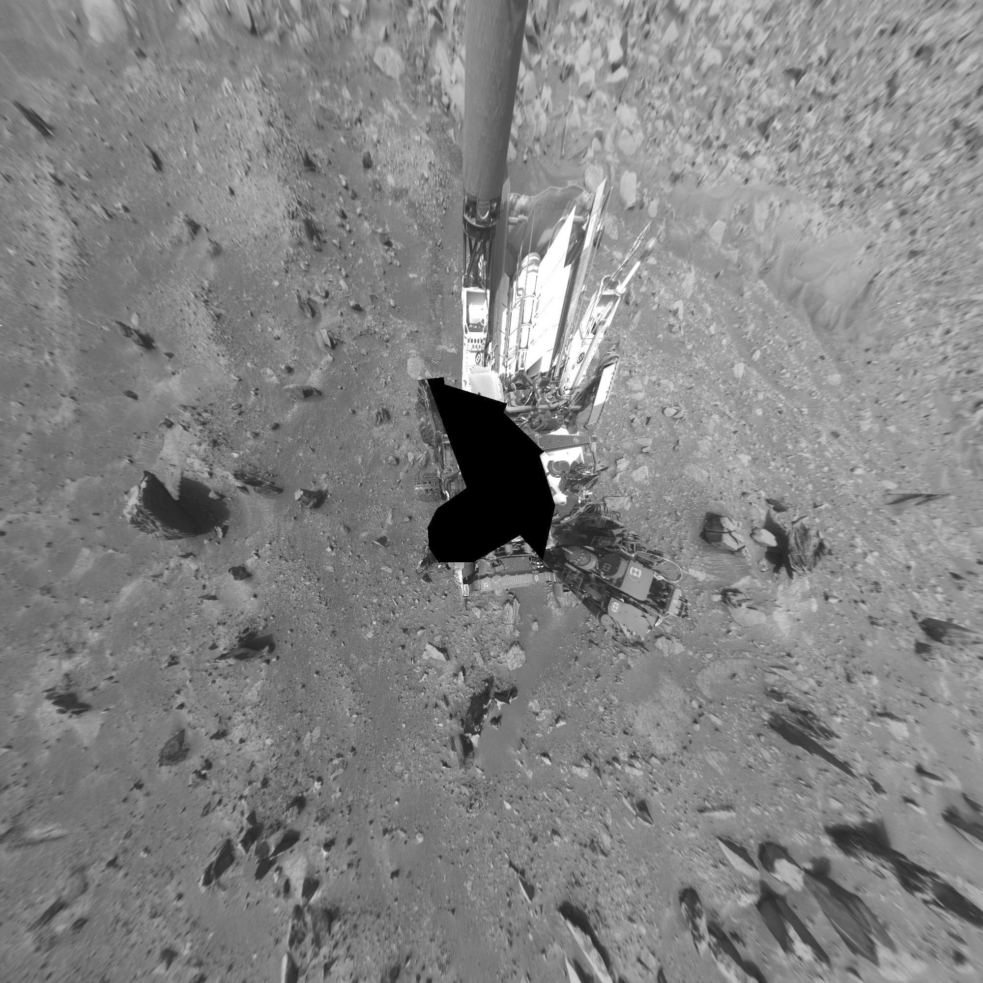 This projection provides an overhead view, but introduces distortion for items not on the surface, such as large rocks and the rover itself. Curiosity took the images on May 23, 2024, Sol 4193 of the Mars Science Laboratory mission at drive 2054, site number 107. The local mean solar time for the image exposures was 2 PM.